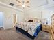 Spacious main bedroom features neutral tones and en suite bathroom at 7522 Porrera St, Charlotte, NC 28214