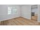 Dining area with hardwood floors and kitchen access at 805 Bent Wood Ct, Matthews, NC 28105