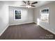 Bright bedroom with neutral walls, plush carpeting, and large windows at 1005 Woodland Dr, Gastonia, NC 28054