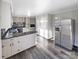 Modern kitchen with stainless steel appliances and granite counters at 1005 Woodland Dr, Gastonia, NC 28054