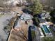 Aerial view of house, pool, and neighboring properties at 1024 Queens Rd, Charlotte, NC 28207