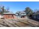 Back of the house, showing a detached garage and brick structures at 1024 Queens Rd, Charlotte, NC 28207