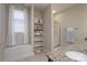 Clean bathroom with a shower/tub combo and built-in shelving at 1361 Colwick Ln, Rock Hill, SC 29732