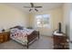 Cozy bedroom with a full-size bed and window seat at 1361 Colwick Ln, Rock Hill, SC 29732