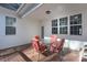Covered deck with seating area, perfect for outdoor dining at 1361 Colwick Ln, Rock Hill, SC 29732