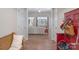 Bright and spacious entryway with wooden bench and red coat rack at 1361 Colwick Ln, Rock Hill, SC 29732