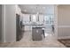 Modern kitchen with white cabinets, granite countertops, and stainless steel appliances at 1361 Colwick Ln, Rock Hill, SC 29732