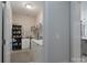 Convenient laundry room with washer, dryer, and shelving at 1361 Colwick Ln, Rock Hill, SC 29732