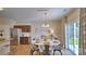 Inviting dining area featuring a round table, stainless steel refrigerator, and kitchen view at 1381 6Th Ne St, Hickory, NC 28601