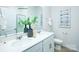Bright bathroom featuring a double vanity with modern fixtures and stylish decor at 1386 6Th Ne St, Hickory, NC 28601