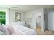 Serene bedroom with white furniture, walk-in closet, and natural light at 1386 6Th Ne St, Hickory, NC 28601