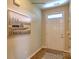 Light and airy entryway with hardwood floors and a view into the dining area at 1389 6Th Ne St, Hickory, NC 28601