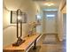 Elegant entryway with a wooden console table, and hardwood floors at 1389 6Th Ne St, Hickory, NC 28601