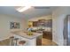 Modern kitchen with granite countertops, stainless steel appliances, and an island with seating at 1389 6Th Ne St, Hickory, NC 28601