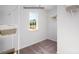Organized closet with shelves and ample storage space, illuminated by a natural light window at 1427 5Th Street Ne Dr, Hickory, NC 28601
