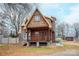 A charming A-frame home with wood siding and a spacious deck at 1505 S Ridge Ave, Kannapolis, NC 28083