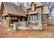 Rustic house exterior with unique architectural details and a large backyard at 1505 S Ridge Ave, Kannapolis, NC 28083