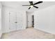 Bright bedroom with double door closet and ceiling fan at 3070 Swallowtail Ln, Kannapolis, NC 28027