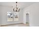 Bright dining room with hardwood floors and large windows at 3070 Swallowtail Ln, Kannapolis, NC 28027