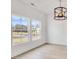 Dining room with hardwood floors and large windows at 3070 Swallowtail Ln, Kannapolis, NC 28027