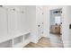 Entryway with bench, cubbies, and coat hooks at 3070 Swallowtail Ln, Kannapolis, NC 28027