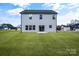 Two-story house with gray siding and yard at 3070 Swallowtail Ln, Kannapolis, NC 28027