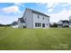 Gray house exterior with backyard view at 3070 Swallowtail Ln, Kannapolis, NC 28027