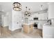 Modern kitchen with white cabinets, an island, and stainless steel appliances at 3070 Swallowtail Ln, Kannapolis, NC 28027
