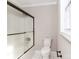 Simple bathroom with shower/tub combo, toilet, and tiled floor at 315 Harvard Dr, Albemarle, NC 28001