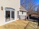 Deck overlooking the backyard with a view of woods at 315 Harvard Dr, Albemarle, NC 28001