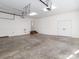 Bright and spacious garage with concrete floor and extra storage at 315 Harvard Dr, Albemarle, NC 28001