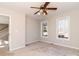 Empty spare bedroom with neutral walls, carpet, and ceiling fan at 315 Harvard Dr, Albemarle, NC 28001