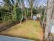 Spacious backyard with a shed and mature trees at 531 Manhasset Rd, Charlotte, NC 28209