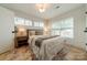 Bright bedroom featuring a cozy bed and ample natural light at 531 Manhasset Rd, Charlotte, NC 28209