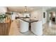 Bright dining room with a large table and modern light fixture at 531 Manhasset Rd, Charlotte, NC 28209