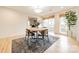 Charming dining area with hardwood floors and a modern light fixture at 531 Manhasset Rd, Charlotte, NC 28209