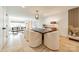 Modern dining room with light wood floors and six chairs at 531 Manhasset Rd, Charlotte, NC 28209