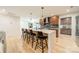 Modern kitchen with an island and four barstools at 531 Manhasset Rd, Charlotte, NC 28209