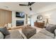 Spacious living room with a modern fireplace and large TV at 531 Manhasset Rd, Charlotte, NC 28209