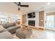 Modern living room with fireplace and access to backyard at 531 Manhasset Rd, Charlotte, NC 28209
