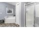 Main bathroom with soaking tub, shower, and updated flooring at 6328 W Nc 10 Hwy, Hickory, NC 28602