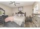 Spacious bedroom with a large bed and ceiling fan at 6328 W Nc 10 Hwy, Hickory, NC 28602