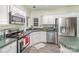 Modern kitchen with stainless steel appliances and corner sink at 6328 W Nc 10 Hwy, Hickory, NC 28602