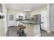 Galley kitchen with stainless steel appliances and breakfast bar at 6328 W Nc 10 Hwy, Hickory, NC 28602