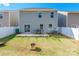 Home's backyard features a patio, grassy area, and fire pit at 9353 Creedmore Hills Dr, Charlotte, NC 28214