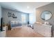 Bedroom featuring a crib, changing station, and ample closet space at 9353 Creedmore Hills Dr, Charlotte, NC 28214