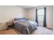 Bright bedroom with a double bed, nightstands, and window coverings at 9353 Creedmore Hills Dr, Charlotte, NC 28214