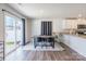 Bright dining area with sliding glass doors leading to the patio at 9353 Creedmore Hills Dr, Charlotte, NC 28214
