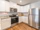 Modern kitchen with stainless steel appliances and granite countertops at 9353 Creedmore Hills Dr, Charlotte, NC 28214
