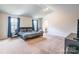 Spacious main bedroom with high ceilings and en-suite bathroom at 9353 Creedmore Hills Dr, Charlotte, NC 28214
